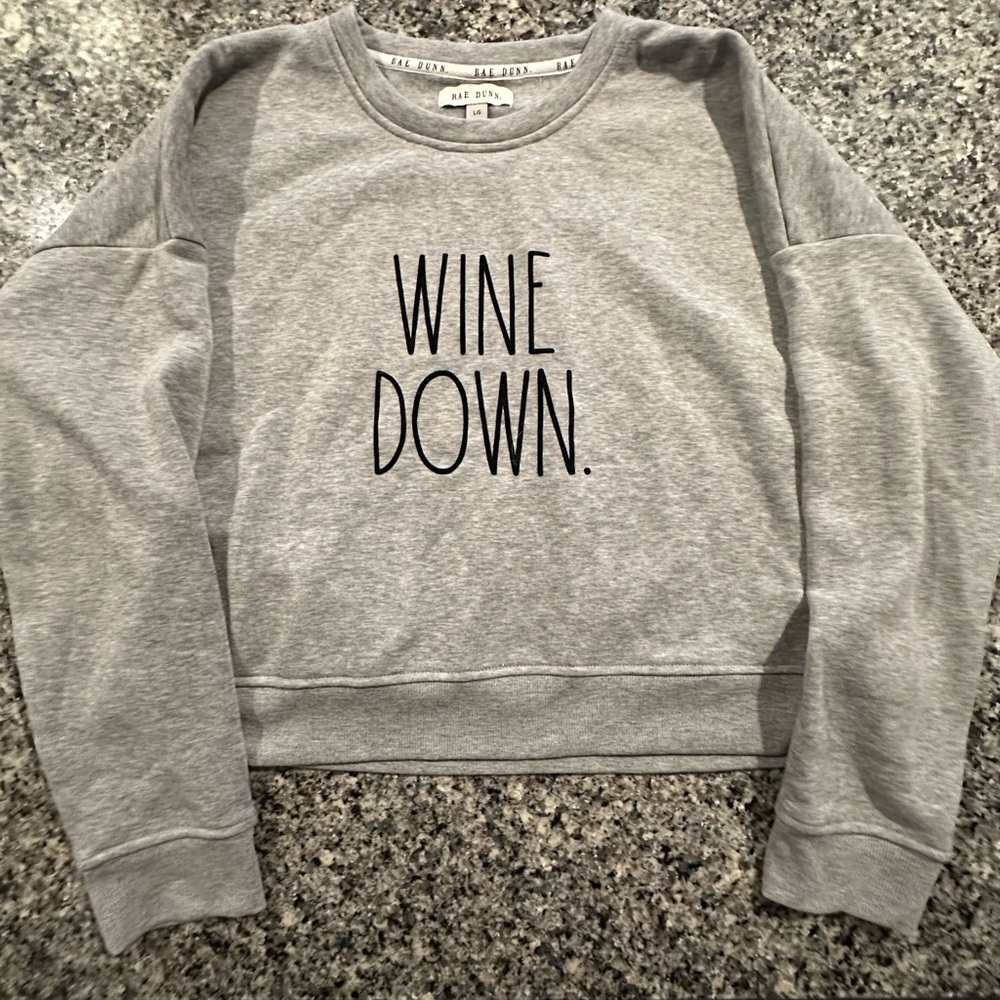 Rae Dunn Gray 'Wine Down' Sweatshirt
Soft gray sweatshirt.Super soft and cozy.
